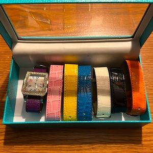7 pc Watch and Bands with case.